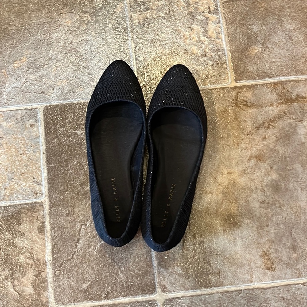 Black sparkly flats.